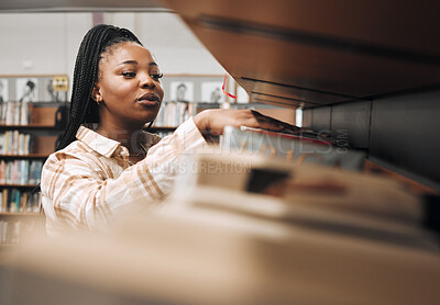 Buy stock photo Black woman, library shelf and books for reading, student knowledge or education development at university. African woman, young college girl and learning, study or university research at bookstore