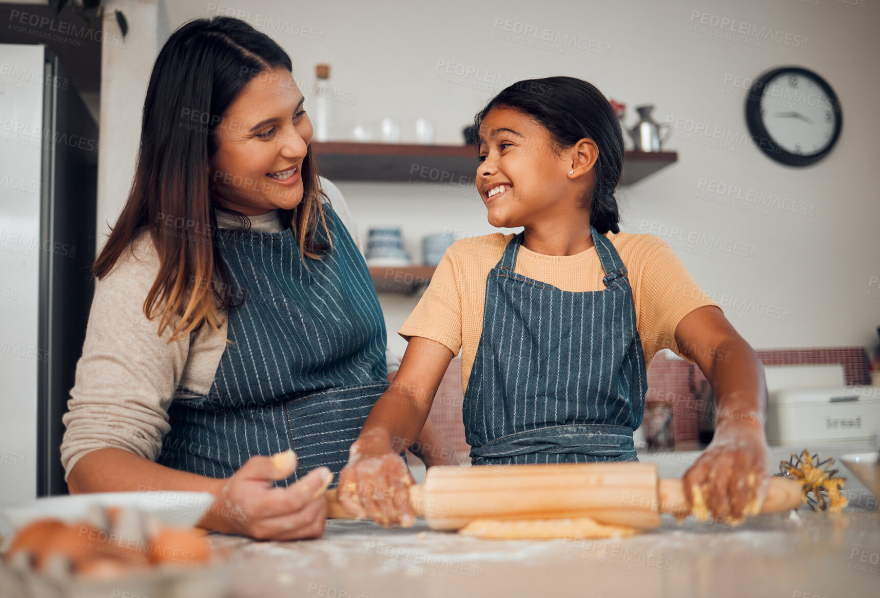 Buy stock photo Family, mother and girl learning baking in kitchen, bonding and having fun. Food, cooking education and mom teaching chef kid how to bake delicious pastry, smiling and enjoying quality time together.