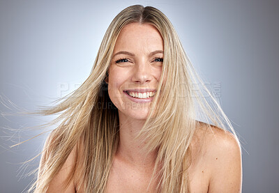 Buy stock photo Hair care, wellness and portrait of a happy woman in studio with brazilian, keratin or hair treatment. Happiness, smile and female model from Australia with long, shiny and straight hair style.