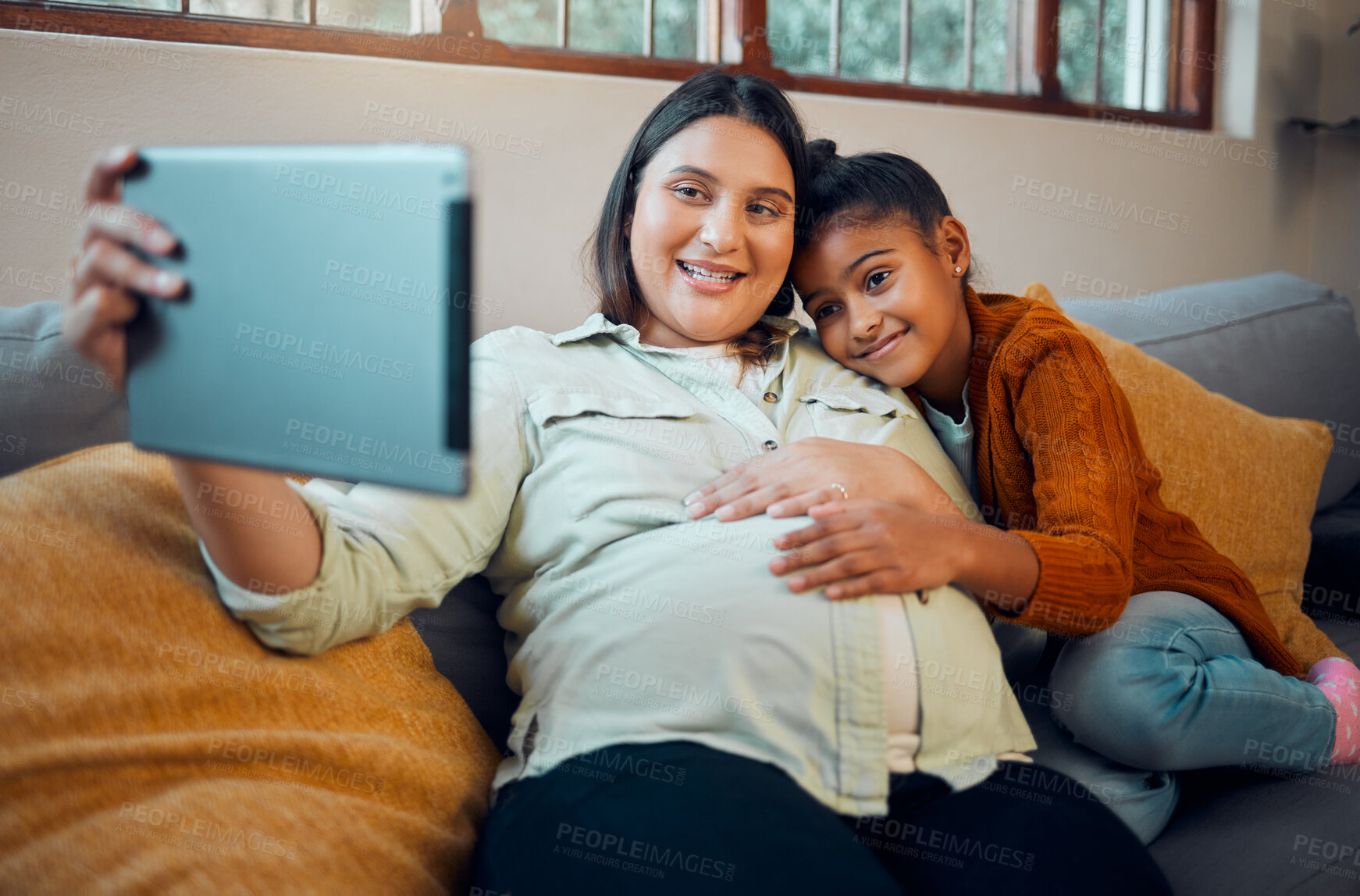 Buy stock photo Pregnant mother, girl or tablet on video call on sofa in house or home living room in lockdown communication, social media or selfie. Smile, happy or pregnant mom and bonding child on zoom technology