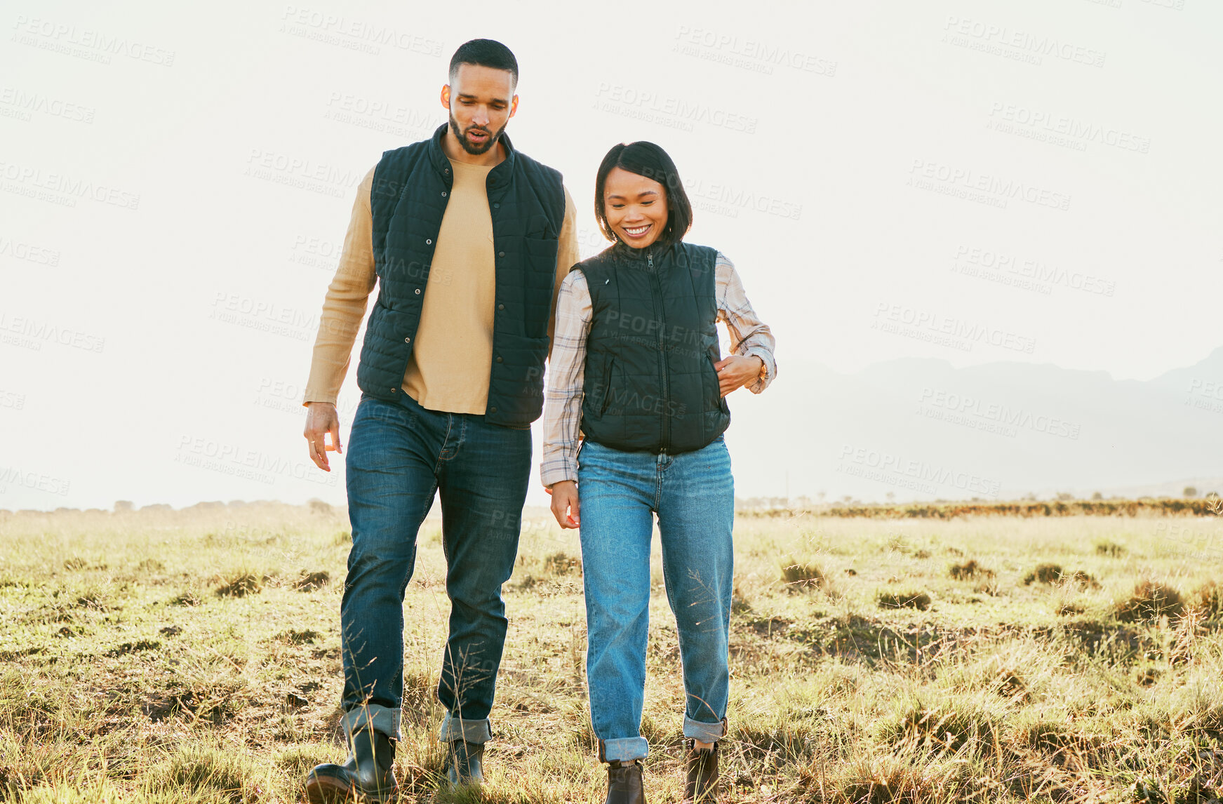 Buy stock photo Farming couple, bonding or walking on nature field, sustainability agriculture environment or countryside land. Smile, happy or farmer man and woman talking and planning farm growth, success or ideas
