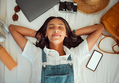 Buy stock photo Top view, relax and woman sleeping on bed at hotel on vacation, holiday or trip. Phone mockup, travel dream and happy female in bedroom at motel, resort or lodge with camera, laptop and headphones 