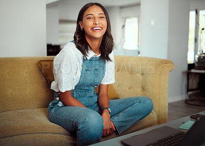 Buy stock photo Portrait, laptop and relax with a woman on a sofa in the living room of her home for weekend enjoyment. Happy, smile and search with an attractive young female browsing the internet in her house