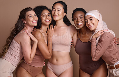 Buy stock photo Diversity, women and body positive support in studio for body care wellness, beauty and skincare portrait. Interracial, group of people and cosmetics self care dermatology for models in underwear