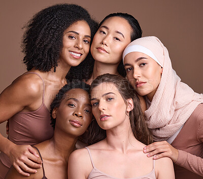 Buy stock photo Diversity, beauty and portrait of a group of women in studio for skincare, makeup or cosmetic routine. Feminism, female empowerment and face of multicultural girl friends isolated by brown background