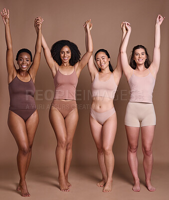 Buy stock photo Women diversity, body positivity and skin color celebration of group of model friends holding hands. Skincare beauty, trust and woman community support portrait together with global care and love