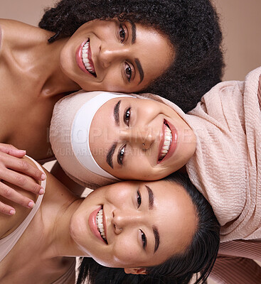 Buy stock photo Face portrait, beauty and diversity of women in studio on a brown background. Cosmetics, skincare makeup and group of different female models happy with facial treatment for wellness and healthy skin