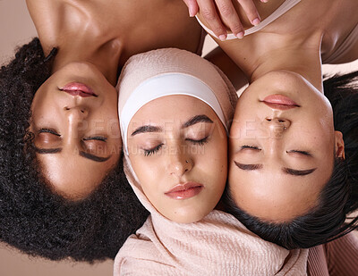Buy stock photo Diversity, woman and face, closed eyes for beauty, skincare wellness or cosmetics dermatology in studio. Natural makeup, facial care glow and interracial models relax, calm and peace for inclusion