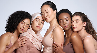Buy stock photo Face, beauty and group of women with eyes closed in studio isolated on gray background. Diversity, skincare cosmetics or makeup of girls, female models or friends posing for inclusion or self love.