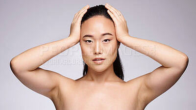 Buy stock photo Portrait, cosmetics and Asian woman with skincare, wellness and natural beauty on grey studio background. Female, girl and makeup for face detox, smooth and clear skin for organic facial or confident
