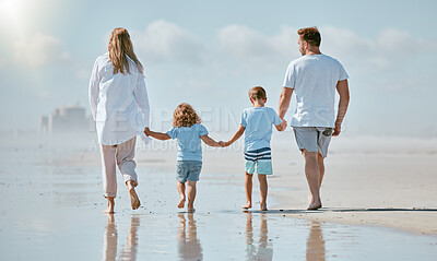 Buy stock photo Family, beach and holding hands while walking in water on summer vacation with parents and children together for love, trust and support. Man, woman and kids at sea for a walk while on travel holiday