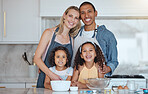 Happy, smile and portrait of a family in the kitchen cooking together for a party, dinner or event. Happiness, love and interracial parents bonding and baking with their children in their modern home