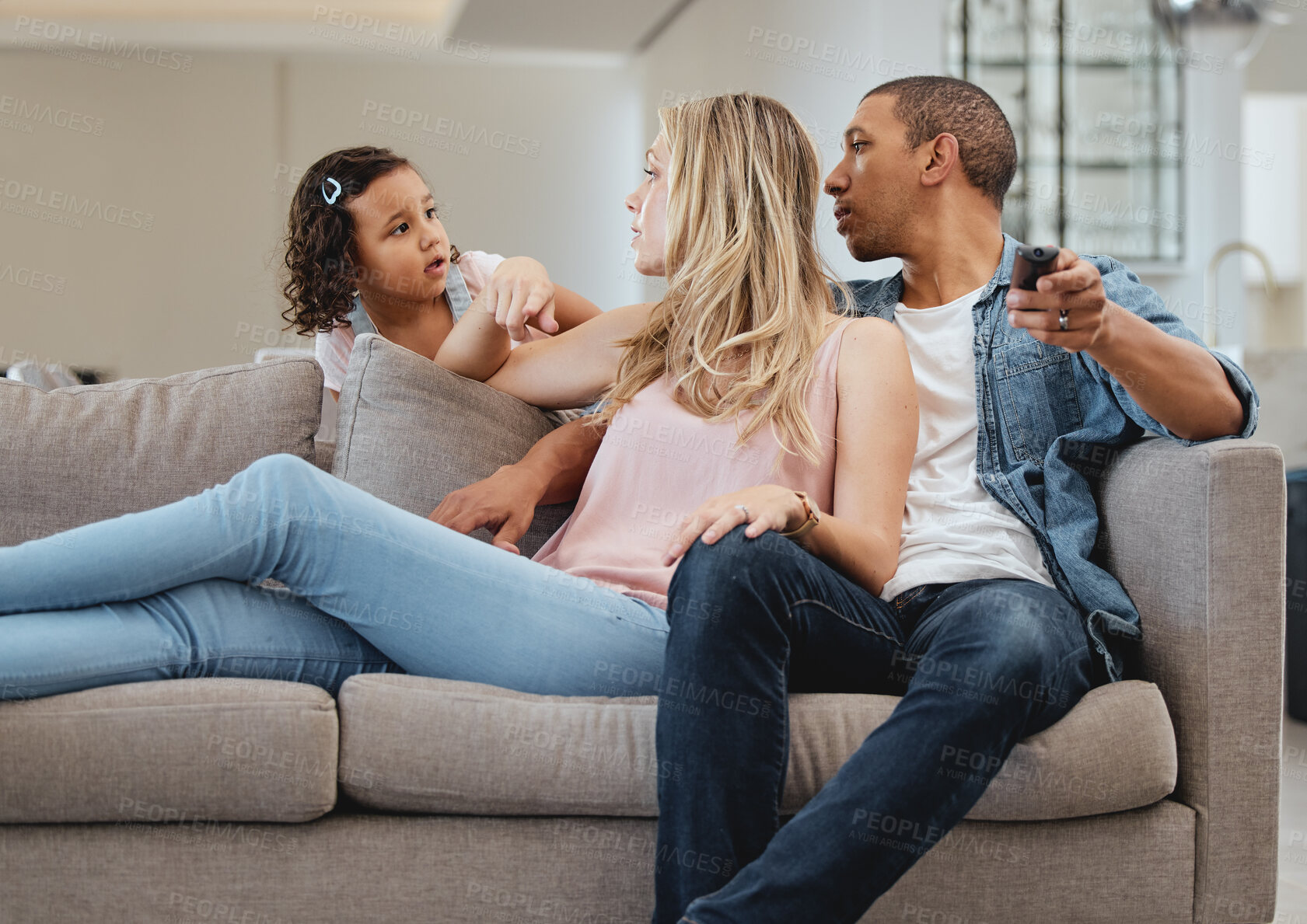 Buy stock photo Family, children and watching tv with a mother, daughter and father in the living room of their home together. Sofa, movie and kids with a diversity man, woman and girl bonding in their house