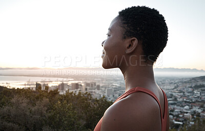 Buy stock photo Black woman, fitness or city view in sunrise workout, training or exercise for healthcare wellness, cardiovascular strength or marathon. Happy smile, sports runner or sunset break on mountains road