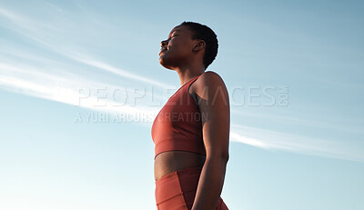 Buy stock photo Fitness, meditation and woman on blue sky to breathe fresh air, freedom and energy to exercise, workout and do yoga or cardio training outdoor in nature. Black female take breath for mental health