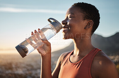 Buy stock photo Water, relax and black woman training in nature, happy hiking and fitness progress in Taiwan. Hydration, thirsty and African runner with a drink after sports exercise, running and morning workout