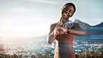 Fitness, black woman and checking digital watch for heart rate, pulse or cardio performance in nature. Happy African American woman monitoring smart watch after health exercise or workout in the city