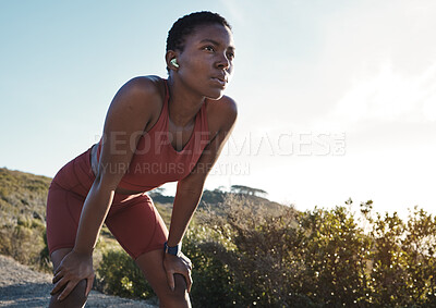 Buy stock photo Tired, motivation and black woman running in nature, training exercise and fitness idea in Morocco. Breathing, relax and African runner thinking of a mountain workout, sports and cardio start