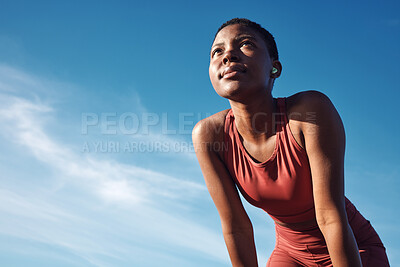 Buy stock photo Black woman, exercise or tired after training, running or workout for balance, wellness or health outdoor. Sky, African American female, runner or athlete relax, breathing or focus for cardio or rest