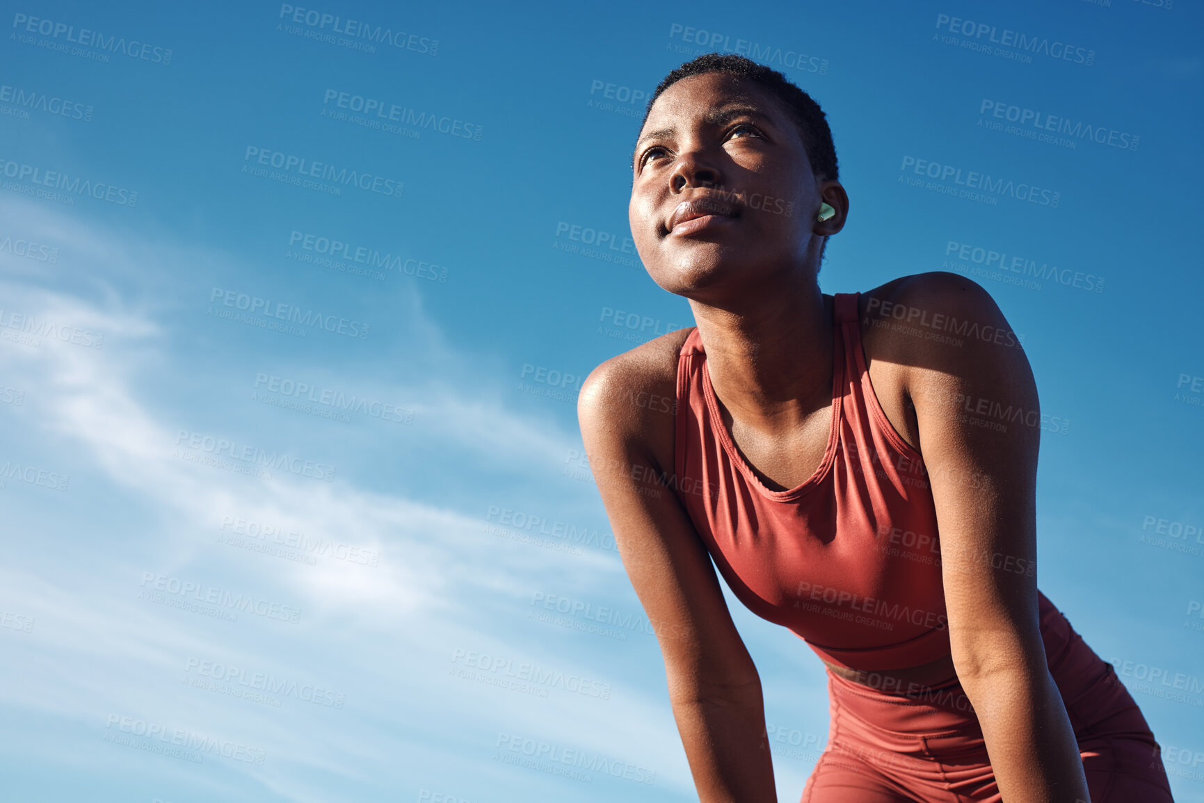 Buy stock photo Black woman, exercise or tired after training, running or workout for balance, wellness or health outdoor. Sky, African American female, runner or athlete relax, breathing or focus for cardio or rest