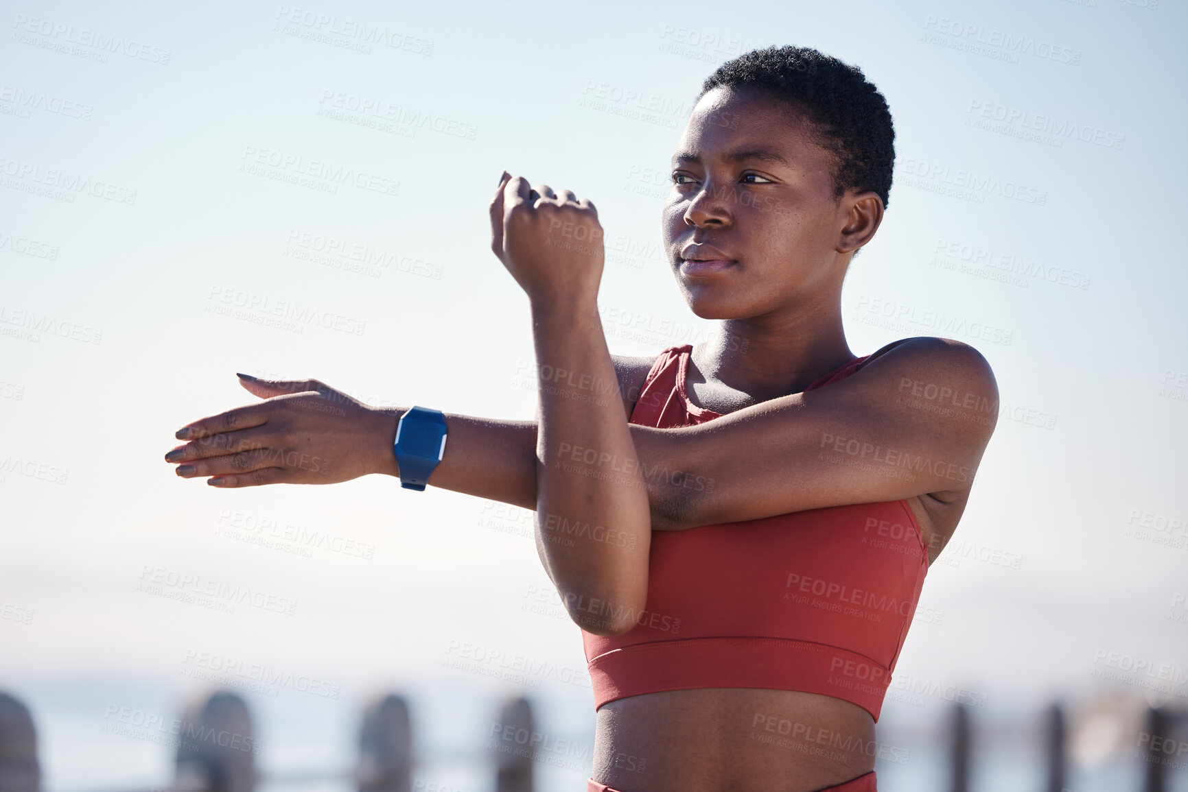 Buy stock photo Black woman, fitness and stretching arms for exercise, workout or cardio training in the outdoors. African American woman in warm up arm stretch for healthy exercising, sports or activity in nature