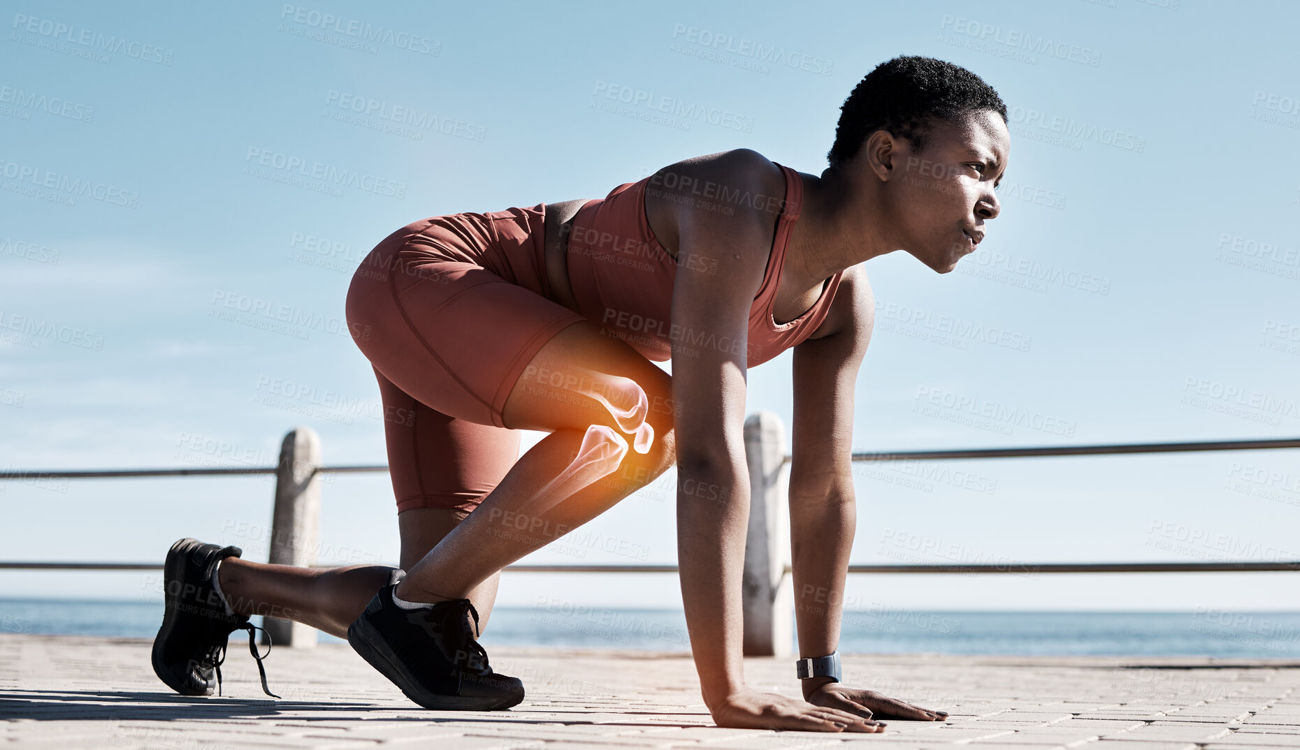Buy stock photo Black woman, fitness and runner with knee x ray in sports training, workout or exercise in the outdoors. Determined African American woman getting ready for running, race or sprint in motivation
