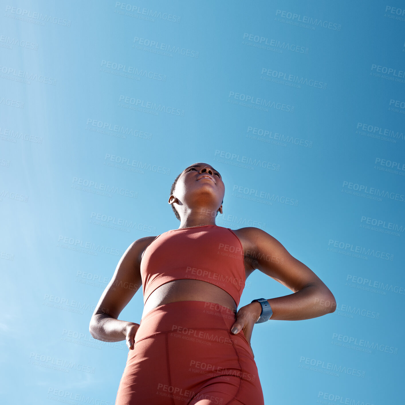 Buy stock photo Low angle, sports fitness and black woman outdoor getting ready for workout, training or exercise with mock up. Blue sky, health and female runner thinking of exercising, cardio or jog for wellness.