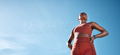 Buy stock photo Fitness, black woman and blue sky, mockup and background of vision, mindset and motivation for exercise goals, healthy lifestyle or body wellness. Low angle, female sports athlete and outdoor mock up