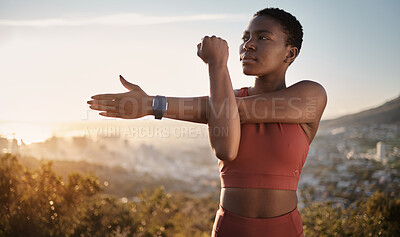 Buy stock photo Exercise, fitness and black woman stretching arm outdoors for health and wellness. Thinking, sports training and female preparing, warm up and getting ready for cardio, workout or running at sunset.