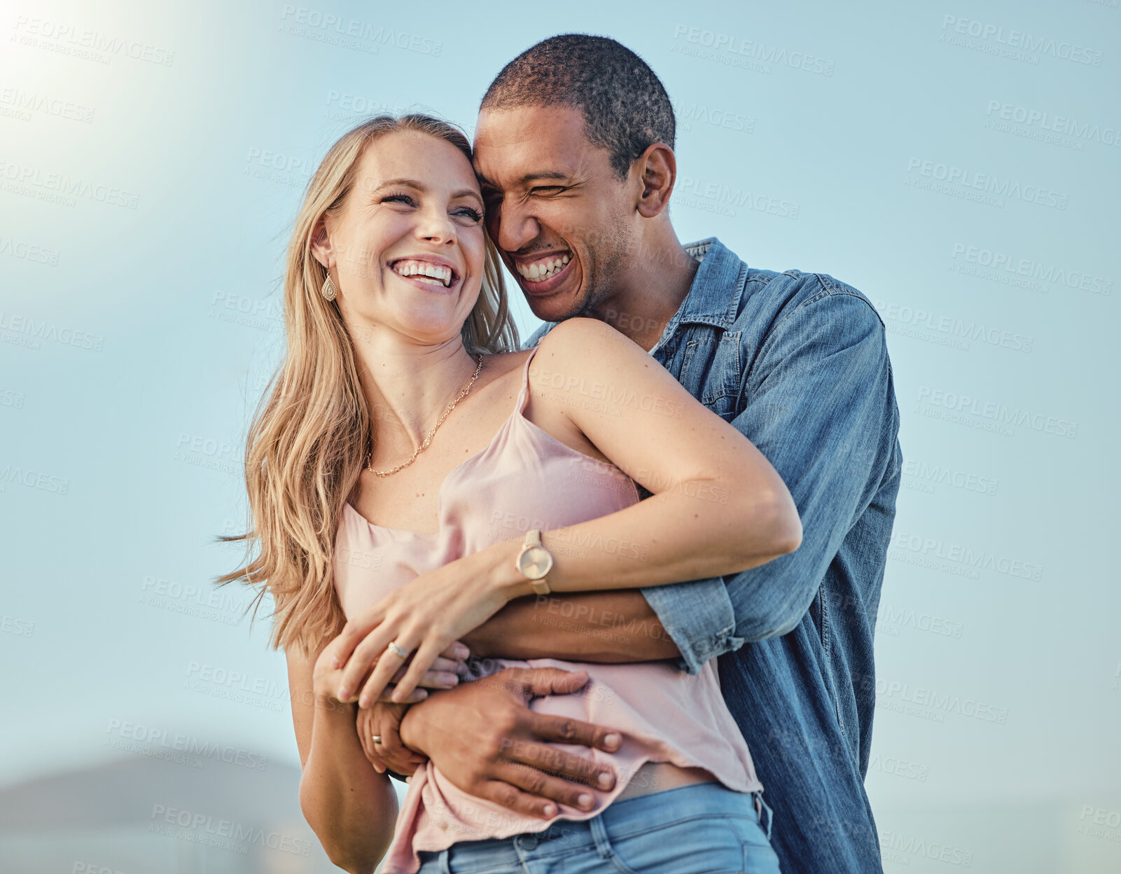 Buy stock photo Love, diversity and couple hug on vacation, holiday or summer trip. Romantic, relax smile and happy man and woman hugging, embrace or cuddle, having fun and enjoying quality time together outdoors