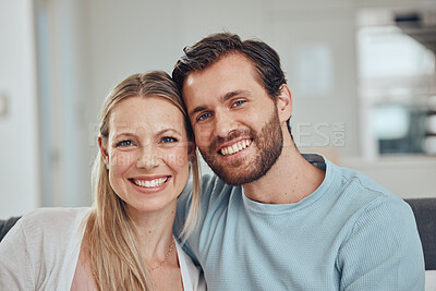 Buy stock photo Portrait, love and couple relax on a sofa, embrace and smile while bonding in their home together. Face, man and woman  hug, happy and enjoy quality time, relationship and fun in their living room