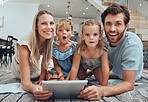 family, tablet and happy portrait on floor in living room for relax fun activity, quality time and relationship bonding for love, support and care. Happiness, parents and children together on device