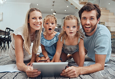 Buy stock photo family, tablet and happy portrait on floor in living room for relax fun activity, quality time and relationship bonding for love, support and care. Happiness, parents and children together on device