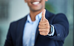 Thumbs up, success and hand of businessman in the office with an approval, agreement or positive gesture. Happiness, successful and professional male employee with a thank you thumbsup in workplace.