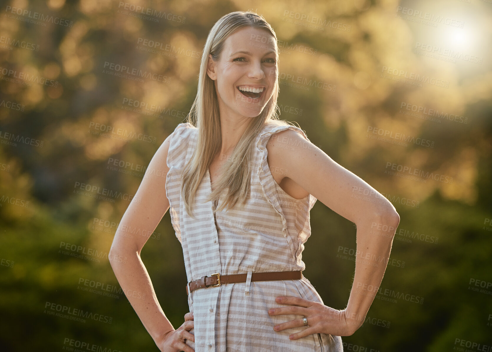 Buy stock photo Portrait, happy and woman relax in park, smile and cheerful while walking in nature, fresh air and joy. Face, girl and adventure in forest, excited and having fun, pose and laugh on bokeh background