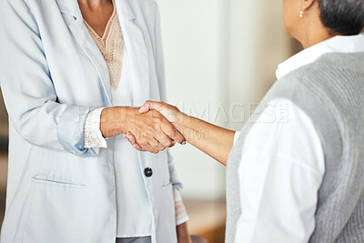 Buy stock photo Partnership, handshake and business women in corporate workplace for teamwork, business deal and collaboration. B2b network, support and female workers shaking hands for agreement, goals and trust