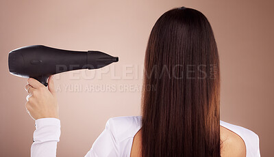 Buy stock photo Hair, hair care and beauty with woman and hairdryer, cosmetic appliance or tools for keratin treatment, Brazilian and back view. Glow, shine and wellness with strong long hair with studio background.