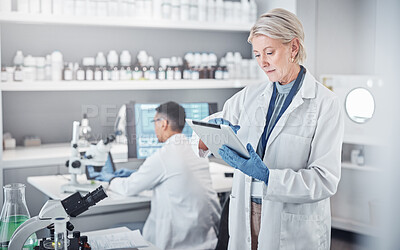 Buy stock photo Senior scientist woman, tablet and laboratory for analysis, research or focus in pharmaceutical study. Science team, lab or planning for future virus, bacteria or vision for pharma solution in Sweden