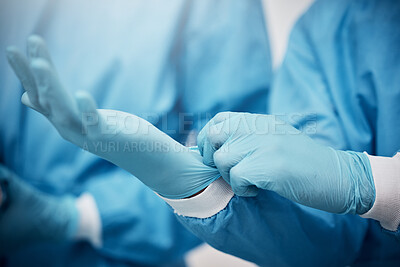 Buy stock photo Healthcare, hands and doctor with gloves in hospital ready for surgery, operation or procedure. Safety scrubs, latex ppe and medical professional, surgeon or nurse in operation theater in clinic.