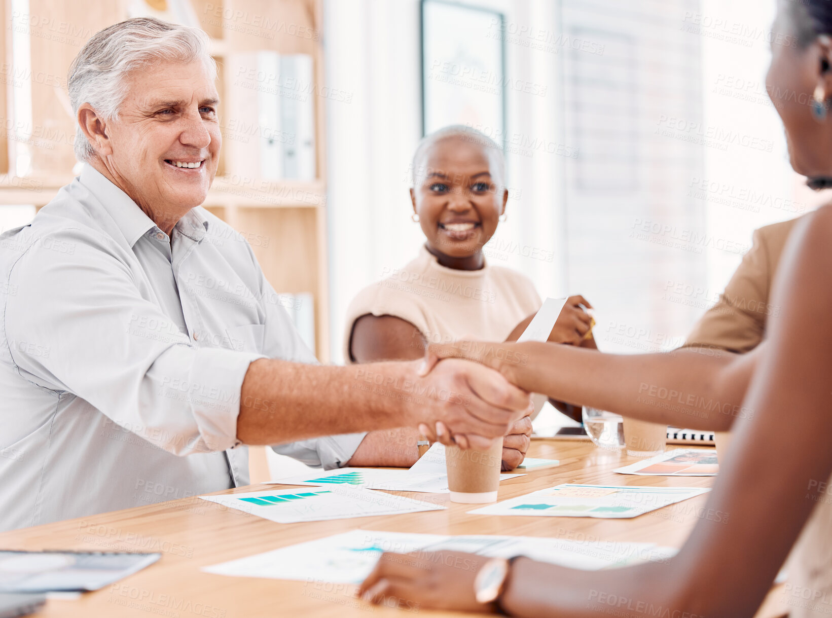 Buy stock photo Handshake, hiring or CEO shaking hands with black woman for job interview success meeting in business office. Partnership, thank you or happy senior hr manager with hand shake for congratulations 