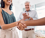 Handshake, deal and business partnership agreement with applause at startup office. Shaking hands, thank you and corporate welcome to new recruit or happy partner. Hand shake at recruitment meeting.