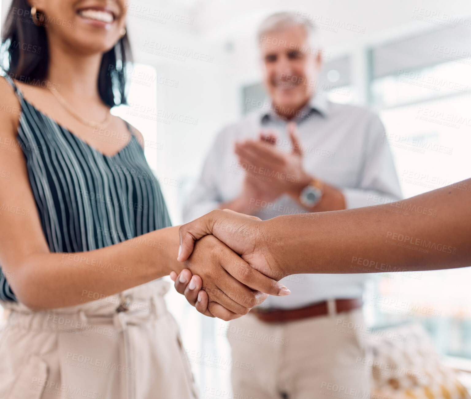 Buy stock photo Handshake, deal and business partnership agreement with applause at startup office. Shaking hands, thank you and corporate welcome to new recruit or happy partner. Hand shake at recruitment meeting.