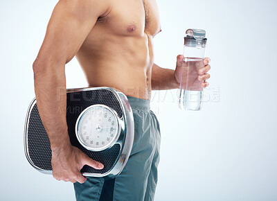 Buy stock photo Man, water bottle or scale for body fitness, workout or training progress in healthcare wellness, diet control or muscle growth. Sports athlete, personal trainer or coach with weight scale or drink
