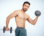Bodybuilder man, dumbbell and portrait in studio for health, exercise and fitness with balance. Bodybuilding, muscle development and focus with strong arm, wellness and workout by studio background