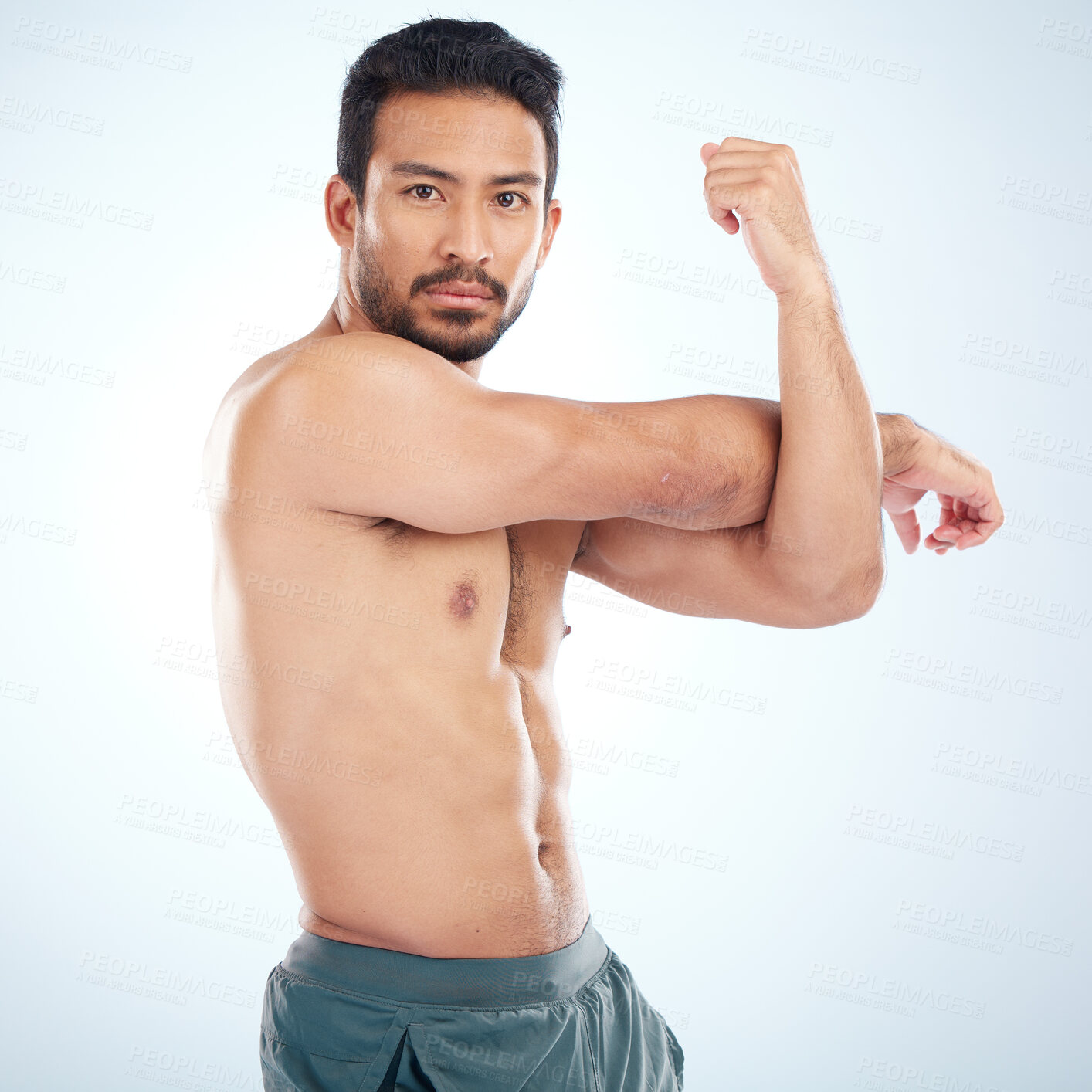 Buy stock photo Man, body or stretching arms on studio background in workout start, exercise pain relief or training healthcare wellness. Portrait, sports athlete or fitness model warm up of strong muscles