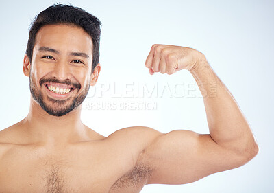 Buy stock photo Portrait, fitness or man in studio to flex muscle or strong arms training biceps in workout or exercise. Face, happy smile or healthy bodybuilder with growth mindset, motivation or wellness goals