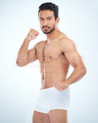 Buy stock photo Fitness, underwear and man with fist, studio or martial arts with muscle, wellness and strong by backdrop. Model, mma and shirtless with balance, posture and portrait by studio background with focus