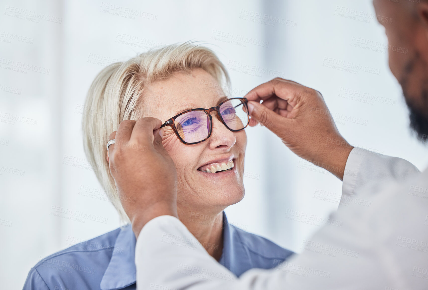 Buy stock photo Vision, glasses with doctor and patient, eyes health and optometry, senior woman with black man at clinic. Eye exam, ophthalmology and health insurance with happy customer, consultation and glaucoma.