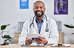 Happy, smile and portrait of an African doctor sitting in his office after a consultation at the clinic. Healthcare, professional and male medical worker analyzing results in a medicare hospital.