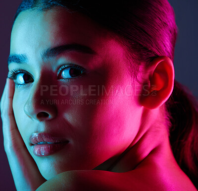 Buy stock photo Beauty, neon shadow light and portrait of woman with dark lighting, facial cosmetics and skincare glow. Luxury studio makeup, aesthetic creativity and face model with creative pink blue color design